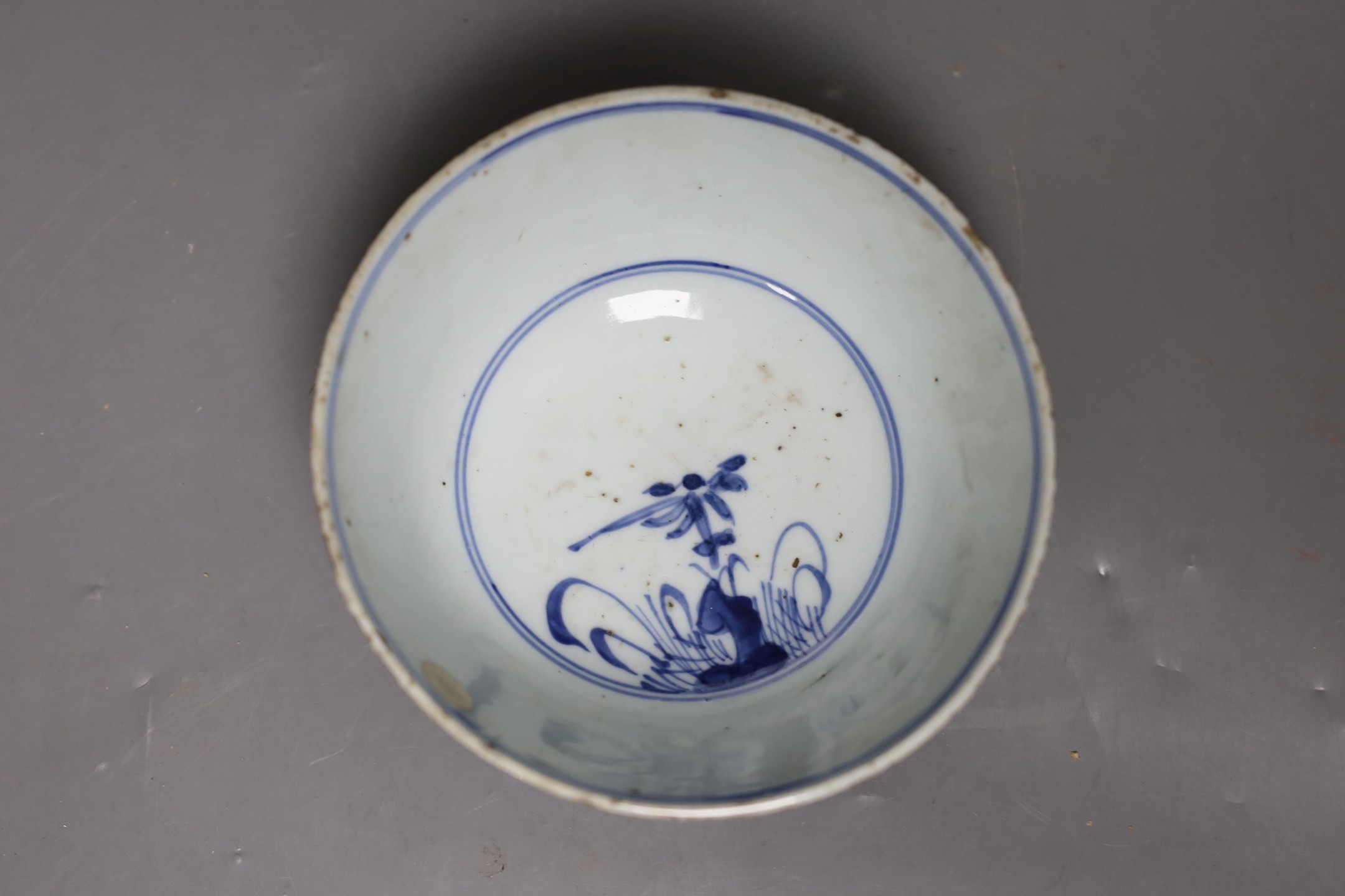 A Chinese blue and white ‘phoenix’ deep bowl, 17th century, 15.5cm